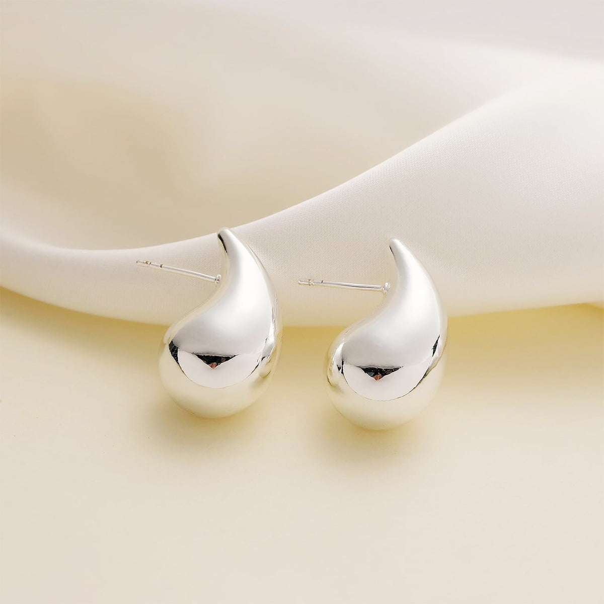 Brinco de Aço Gota Fascínio 14x14mm - foto 4